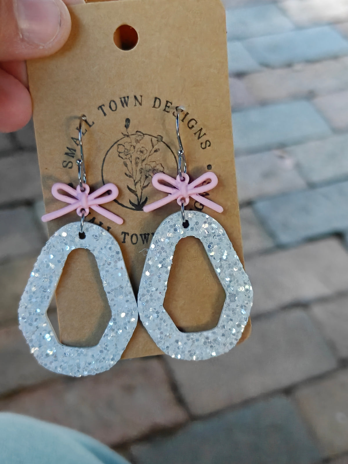Pink and white dangles
