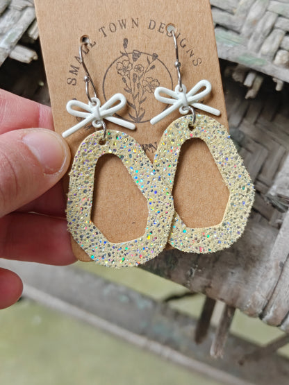 Glitzy Yellow Bow Dangles