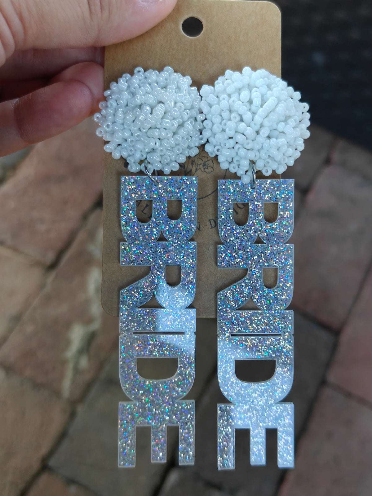 Silver rainbow stud bride